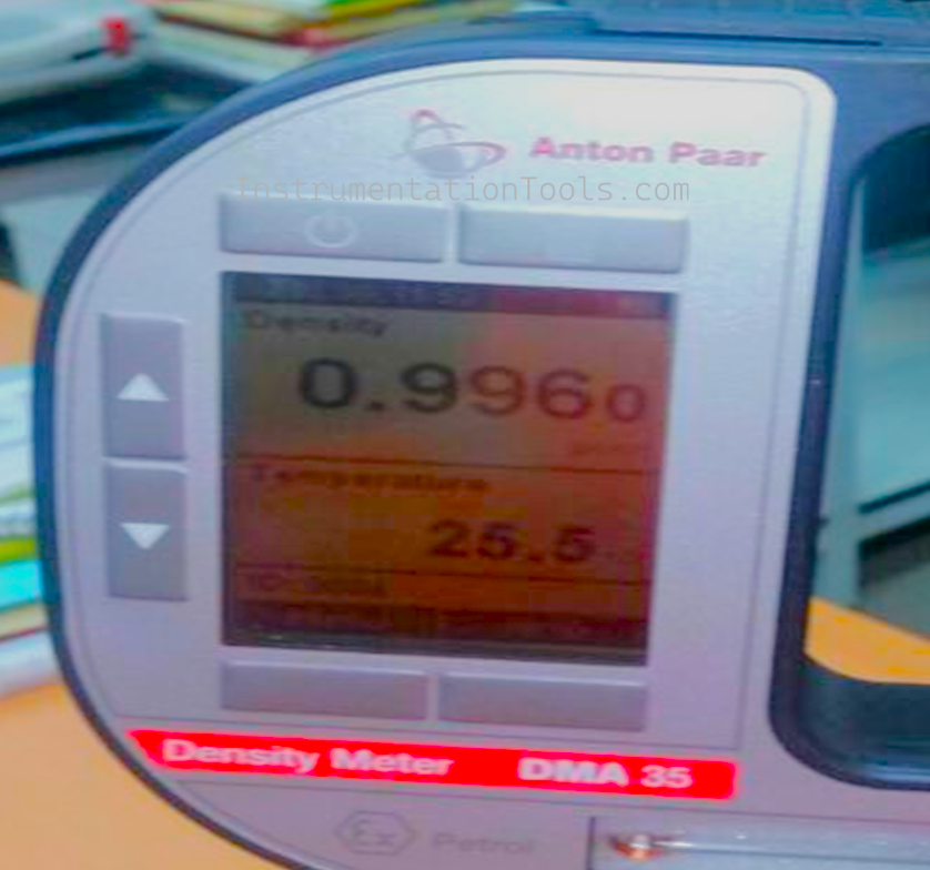 Laboratory density meter reading density of water sample